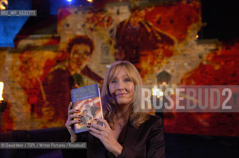 JK Rowling at the Harry Potter and The Half Blood Prince launch at Edinburgh Castle. Pictured holding up the book in front of the castle walls. Dated 15/7/2005..copyright©David Moir/TSPL/Writer Pictures/Rosebud2