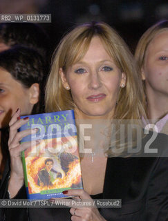JK Rowling at the Harry Potter and The Half Blood Prince launch at Edinburgh Castle. Pictured holding up the book in front of the castle walls. Dated 15/7/2005..copyright©David Moir/TSPL/Writer Pictures/Rosebud2
