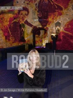 JK Rowling at the Harry Potter and The Half Blood Prince launch at Edinburgh Castle. Pictured holding up the book in front of the castle walls. Dated 15/7/2005..copyright©Jon Savage/Writer Pictures/Rosebud2