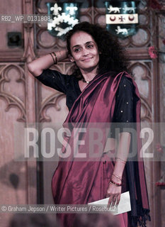 ARUNDHATI ROY WITH HER BOOK AFTER BEING PRESENTED WITH THE BOOKER PRIZE 1997..Copyright©Graham Jepson/Writer Pictures/Rosebud2