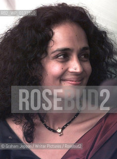 ARUNDHATI ROY WITH HER BOOK AFTER BEING PRESENTED WITH THE BOOKER PRIZE 1997..Copyright©Graham Jepson/Writer Pictures/Rosebud2