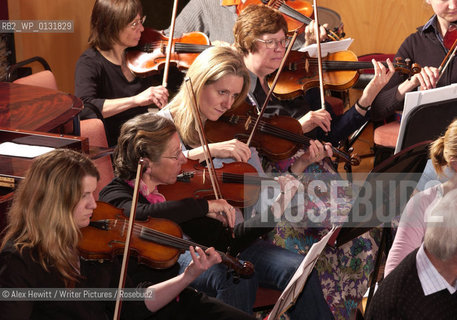 The Really Terrible Orchestra exists to encourage those who have been prevented from playing music, either through lack of talent or some other factor, to play music in the company of similarly afflicted players..Co-founded by Alexander McCall Smith, his wife Elizabeth and Peter Stevenson it is a refuge for misfit musicians of all varieties...Conducted by Richard Neville-Towle..Copyright©Alex Hewitt/Writer Pictures/Rosebud2