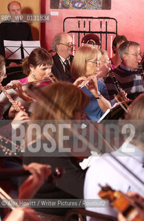 The Really Terrible Orchestra exists to encourage those who have been prevented from playing music, either through lack of talent or some other factor, to play music in the company of similarly afflicted players..Co-founded by Alexander McCall Smith, his wife Elizabeth and Peter Stevenson it is a refuge for misfit musicians of all varieties...Conducted by Richard Neville-Towle..Copyright©Alex Hewitt/Writer Pictures/Rosebud2