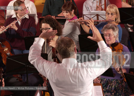 The Really Terrible Orchestra exists to encourage those who have been prevented from playing music, either through lack of talent or some other factor, to play music in the company of similarly afflicted players..Co-founded by Alexander McCall Smith, his wife Elizabeth and Peter Stevenson it is a refuge for misfit musicians of all varieties...Conducted by Richard Neville-Towle..Copyright©Alex Hewitt/Writer Pictures/Rosebud2