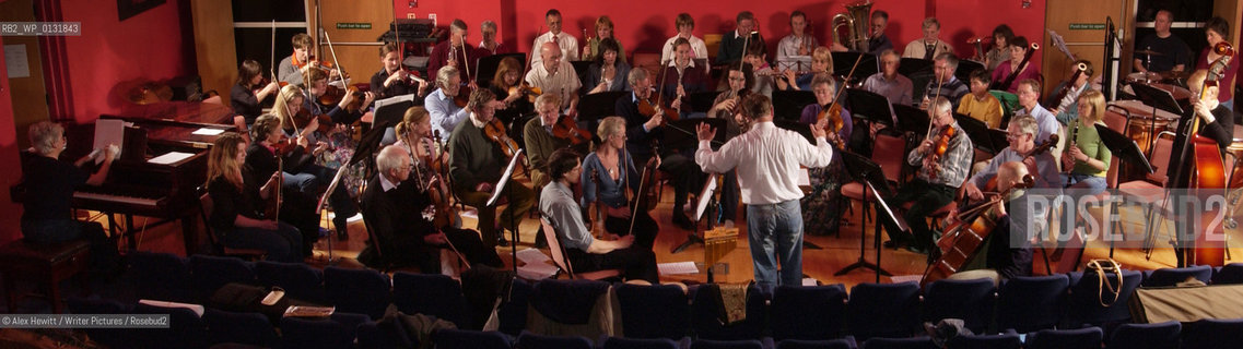 The Really Terrible Orchestra exists to encourage those who have been prevented from playing music, either through lack of talent or some other factor, to play music in the company of similarly afflicted players..Co-founded by Alexander McCall Smith, his wife Elizabeth and Peter Stevenson it is a refuge for misfit musicians of all varieties...Conducted by Richard Neville-Towle..Copyright©Alex Hewitt/Writer Pictures/Rosebud2