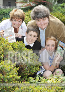 FREE PICTURE FOR PRESS PUBLICITY USE IN CONJUNCTION WITH THE AWARDS.Royal Mail Scottish Childrens Book Awards Photocall, Edinburgh, 09/09/2010:.Children’s authors Cathy MacPhail and John Fardell get to know young book fans Ryan Mackenzie and Amy McMullan (both pictured with parents permission) after a ceremony announcing the shortlist for the 2010 Royal Mail Award for Scottish Children’s Books at Edinburghs Scottish Book Trust.  . Cathys book Grass was nominated by team judge Ryan in the 12-16 years Older Readers category and Johns book The Secret of the Black Moon Moth was nominated by team judge Amy in the 8-11 years Younger Readers category ..©The Royal Mail Awards are managed by the Scottish Book Trust and voted for by Scottish Children themselves. The winners will be announced in February 2011 at Glasgows Tramway Theatre. . Ryan Mackenzie is 15 years old and from Buckie High School, and Amy McMullan is 11 and from Holy Rood High School, Glasgow..Picture from Colin Hattersley/Writer Pictures/Rosebud2