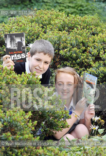 FREE PICTURE FOR PRESS PUBLICITY USE IN CONJUNCTION WITH THE AWARDS.Royal Mail Scottish Childrens Book Awards Photocall, Edinburgh, 09/09/2010:.Young book fans Ryan Mackenzie and Amy McMullan (both pictured with parents permission) after a ceremony announcing the shortlist for the 2010 Royal Mail Award for Scottish Children’s Books at Edinburghs Scottish Book Trust.  .The Royal Mail Awards are managed by the Scottish Book Trust and voted for by Scottish Children themselves. The winners will be announced in February 2011 at Glasgows Tramway Theatre..©Ryan Mackenzie is 15 years old and from Buckie High School, and Amy McMullan is 11 and from Holy Rood High School, Glasgow. .Picture from Colin Hattersley/Writer Pictures/Rosebud2