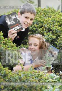 FREE PICTURE FOR PRESS PUBLICITY USE IN CONJUNCTION WITH THE AWARDS.Royal Mail Scottish Childrens Book Awards Photocall, Edinburgh, 09/09/2010:.Young book fans Ryan Mackenzie and Amy McMullan (both pictured with parents permission) after a ceremony announcing the shortlist for the 2010 Royal Mail Award for Scottish Children’s Books at Edinburghs Scottish Book Trust.  .The Royal Mail Awards are managed by the Scottish Book Trust and voted for by Scottish Children themselves. The winners will be announced in February 2011 at Glasgows Tramway Theatre..©Ryan Mackenzie is 15 years old and from Buckie High School, and Amy McMullan is 11 and from Holy Rood High School, Glasgow. .Picture from Colin Hattersley/Writer Pictures/Rosebud2