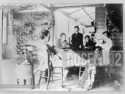 TITLE:  [Robert Louis Stevenson with his family sitting around table at home in the Hawaiian Islands]..CALL NUMBER:  BIOG FILE - Stevenson, Robert Louis, 1850-1894 <item> [P&P]..REPRODUCTION NUMBER:  LC-USZ62-104639 (b&w film copy neg.)..MEDIUM:  1 photographic print...CREATED/PUBLISHED:  c1921...NOTES:..J251002 U.S. Copyright Office...Copyright©by ICA/Writer Pictures/Rosebud2