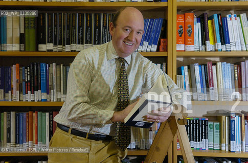 31.01.06 .Edinburgh University Press .Timothy Wright, pictured in a library with books..copyright©Neil Hanna/TSPL/Writer Pictures/Rosebud2