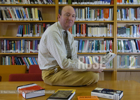 31.01.06 .Edinburgh University Press .Timothy Wright, pictured in a library with books..copyright©Neil Hanna/TSPL/Writer Pictures/Rosebud2