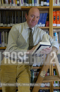 31.01.06 .Edinburgh University Press .Timothy Wright, pictured in a library with books..copyright©Neil Hanna/TSPL/Writer Pictures/Rosebud2