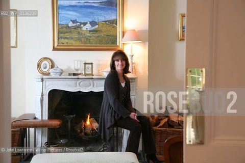 Catherine Alliott at her home Northfield Grange near Tring in Hertfordshire.  Standing outside with front of house...copyright©John Lawrence/Writer Pictures/Rosebud2