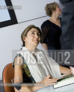 Ingrid Betancourt signing books at “Ingrid Betancourt: Even Silence Has An End.  .In conversation with John McCarthy”, Congress Centre, London, October 6, 2010. ..Copyright©Seb Cunard/Writer Pictures/Rosebud2