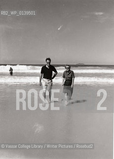 An Undated Photograph showing Elizabeth Bishop and Robert Lowell wading in the Sea..©Vassar College Library/Writer Pictures/Rosebud2