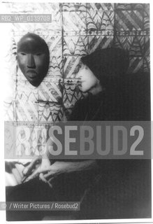 Karen Blixen with African facemask...copyright©/Writer Pictures/Rosebud2