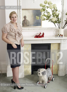 Susie Boyt , author of My Judy Garland Life. Photographed at home in London with her Ruby Red Shoes....Copyright©Geraint Lewis/Writer Pictures/Rosebud2