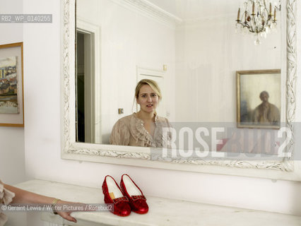 Susie Boyt , author of My Judy Garland Life. Photographed at home in London with her Ruby Red Shoes....Copyright©Geraint Lewis/Writer Pictures/Rosebud2