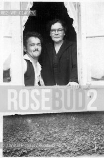 Christy Brown disabled Irish writer. Christy and his mother in the window of 54 Stannaway Road, Kimmage,  Dublin...Copyright©/Writer Pictures/Rosebud2