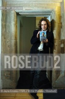 Jamie Byng, Canongate Publishing, Edinburgh, with a book by Barack Obama..copyright©Jayne Emsley/TSPL/Writer Pictures/Rosebud2