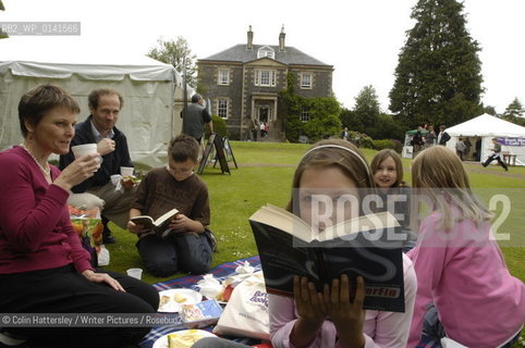 Borders Book Festival in Melrose..Guests enjoy a picnic in the sunshine outside the Festival Marquee with Harmony House visible in the background...Copyright©Colin Hattersley/Writer Pictures/Rosebud2