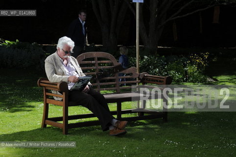 Poet Brian Johnstone enjoys a quiet moment at the Borders Book Festival 2010..The festival runs from Thursday 17th June to Sunday 20th June.for further info please go to the website at www.bordersbookfestival.org or contact Nicky Stonehill on 07740 681 560 or nicky@stonehillsalt.co.uk..Copyright©Alex Hewitt/Writer Pictures/Rosebud2
