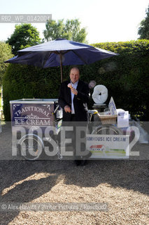James Naughtie enjoys an Ice Cream at the Borders Book Festival 2010..The festival runs from Thursday 17th June to Sunday 20th June.for further info please go to the website at www.bordersbookfestival.org or contact Nicky Stonehill on 07740 681 560 or nicky@stonehillsalt.co.uk..Copyright©Alex Hewitt/Writer Pictures/Rosebud2