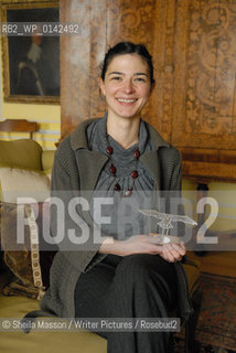 Elen Caldecott, British writer, with her trophy as winner of the first Lennox Author Award at the 2nd annual Lennoxlove Book Festival at Lennoxlove House, Haddington, Scotland, November 20, 2010...Copyright©Sheila Masson/Writer Pictures/Rosebud2