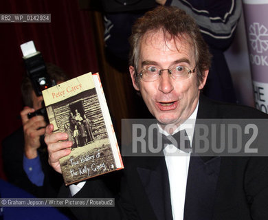 Peter Carey - THE WINNER OF THE BOOKER PRIZE 2001 POSES FOR PHOTOGRAPHERS AT THE LONDON GUILDHALL  ..©Graham Jepson/Writer Pictures/Rosebud2