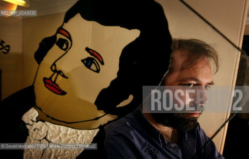 Gerard Carruthers, with an image of Robert Burns, at Glasgow University..copyright©Donald MacLeod/TSPL/Writer Pictures/Rosebud2