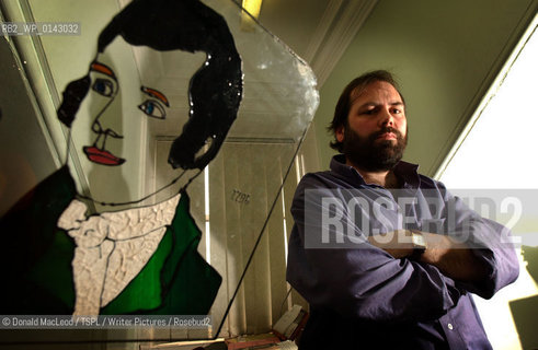 Gerard Carruthers, with an image of Robert Burns, at Glasgow University..copyright©Donald MacLeod/TSPL/Writer Pictures/Rosebud2