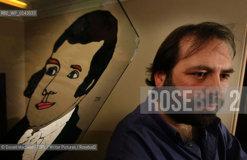 Gerard Carruthers, with an image of Robert Burns, at Glasgow University..copyright©Donald MacLeod/TSPL/Writer Pictures/Rosebud2