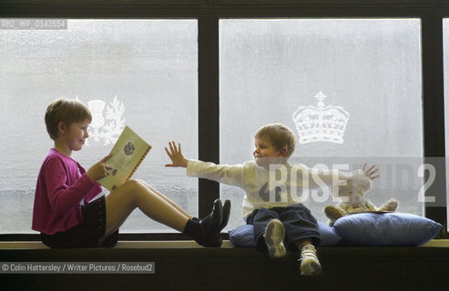National Library of Scotland, Childrens Exhibition This Book Belongs To Me, 30/05/02:.This is my book!: Ellen Mason (aged nine) enjoys a good read with her brother Alex (aged four) at the opening of the This Book Belongs To Me exhibition of childrens literature at the National Library of Scotland...copyright©Colin Hattersley/Writer Pictures/Rosebud2