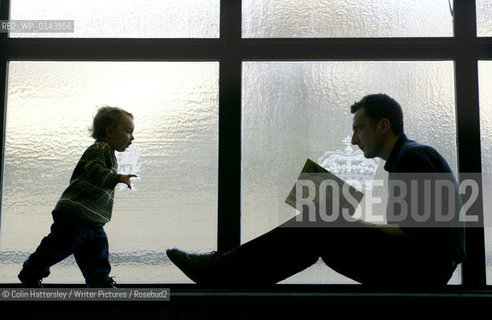 National Library of Scotland, Childrens Exhibition This Book Belongs To Me, 30/05/02:.This is my book!: Ellen Mason (aged nine) enjoys a good read with her brother Alex (aged four) at the opening of the This Book Belongs To Me exhibition of childrens literature at the National Library of Scotland...copyright©Colin Hattersley/Writer Pictures/Rosebud2