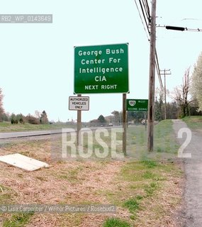 Mariellen OBrien and Karen Chiao in Washington DC..Wives of ex-CIA spies and co-authors of book about their lives..CIA Sign on the freeway..copyright©Lisa Carpenter/Writer Pictures/Rosebud2