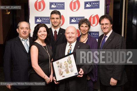The Swan Hellenic Cruises Team, at The Oldie Awards, Simpsons on The Strand pictured with a representative of the Gurkhas..copyright©Adrian Lourie/Writer Pictures/Rosebud2