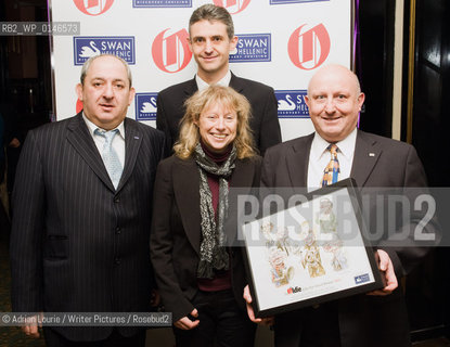 The Swan Hellenic Cruises Team, at The Oldie Awards, Simpsons on The Strand pictured with a representative of the Gurkhas..copyright©Adrian Lourie/Writer Pictures/Rosebud2