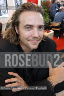 Writer Guillaume Vigneault at the Salon du Livre (Book Fair) in Paris, March 2006....Copyright©Pascal Saez/Writer Pictures/Rosebud2