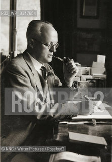 Sir Hugh Walpole at home.English Novelist..Copyright©NNG/Writer Pictures/Rosebud2