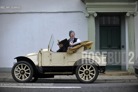Wigtown Book Festival. Paul Kingston takes a break from touring in his 1909 Renault with a book from The Book Shop...copyright©Jayne Emsley/TSPL/Writer Pictures/Rosebud2