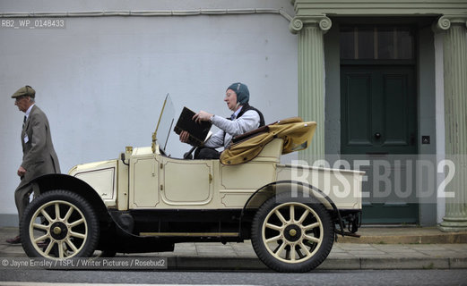 Wigtown Book Festival. Paul Kingston takes a break from touring in his 1909 Renault with a book from The Book Shop...copyright©Jayne Emsley/TSPL/Writer Pictures/Rosebud2