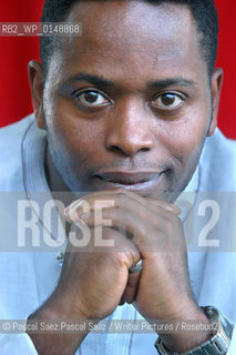 Nigerian writer and journalist Ken Wiwa (son of Ken Saro Wiwa, who was executed by the nigerian government for standing up for the rights of the Ogoni people). Here at the Edinburgh International Book Festival 2005 ..Copyright©Pascal Saez.Pascal Saez/Writer Pictures/Rosebud2