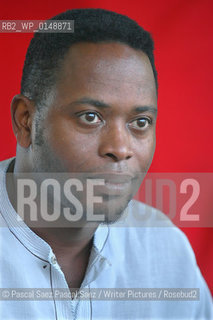 Nigerian writer and journalist Ken Wiwa (son of Ken Saro Wiwa, who was executed by the nigerian government for standing up for the rights of the Ogoni people). Here at the Edinburgh International Book Festival 2005 ..Copyright©Pascal Saez.Pascal Saez/Writer Pictures/Rosebud2