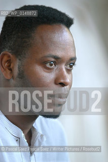 Nigerian writer and journalist Ken Wiwa (son of Ken Saro Wiwa, who was executed by the nigerian government for standing up for the rights of the Ogoni people). Here at the Edinburgh International Book Festival 2005 ..Copyright©Pascal Saez.Pascal Saez/Writer Pictures/Rosebud2