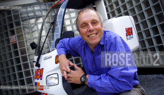 Simon Woodroffe, Chairman of Yo! Sushi who are famous for their automated restaurants.   Pictured with one of their delivery bikes..copyright©Graham Jepson/Writer Pictures/Rosebud2