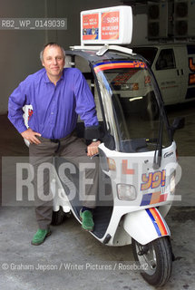 Simon Woodroffe, Chairman of Yo! Sushi who are famous for their automated restaurants.   Pictured with one of their delivery bikes..copyright©Graham Jepson/Writer Pictures/Rosebud2