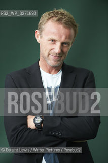 Jo Nesbo, Novelist and writer  at The Edinburgh International Book Festival 2011. The Nordic crime explosion shows no sign of abating and everyone seems to be searching for the next Stieg or Henning. Across the 600 plus pages in The Leopard, Norways Nesbo is looking set on continuing to mine this golden seam. In the depths of winter, the bodies of two young women are found, both with inexplicable wounds. The crime scenes offer no clues, the media are reaching fever pitch, and the police are running out of options. Time to call for Inspector Harry Hole..Copyright©Geraint Lewis/Writer Pictures/Rosebud2