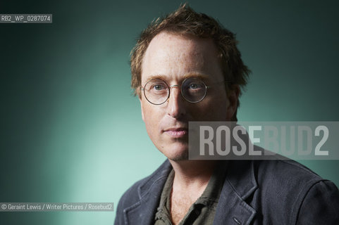 Jon Ronson, novelist and writer at The Edinburgh International Book Festival 2011. After the big screen version of his The Men Who Stare at Goats, Ronson could be forgiven for settling back and writing about annoying waiters and irritating parents. But entertaining as his writing about ordinary life is, he really gets motoring when delving into oddball affairs on a more global scale. In The Psychopath Test, he wants to know whether you can easily tell if someone is a bit unhinged and if it is really true that those in power have many of the characteristics of your classic psychopath..Copyright©Geraint Lewis/Writer Pictures/Rosebud2