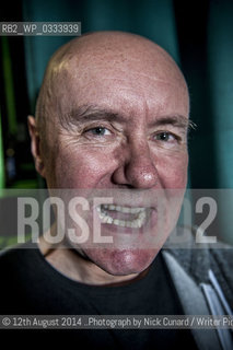 Irvine Welsh at Bookslam literary night at York Hall,  Bethnal Green, London. The night had a boxing theme as authors took the ring to deliver their readings in this iconic boxing venue in the heart of East London..©12th August 2014 ..Photograph by Nick Cunard/Writer Pictures/Rosebud2