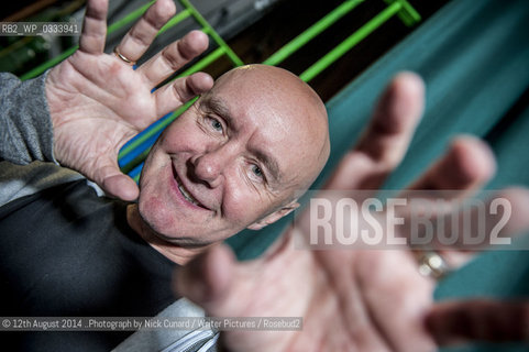 Irvine Welsh at Bookslam literary night at York Hall,  Bethnal Green, London. The night had a boxing theme as authors took the ring to deliver their readings in this iconic boxing venue in the heart of East London..©12th August 2014 ..Photograph by Nick Cunard/Writer Pictures/Rosebud2